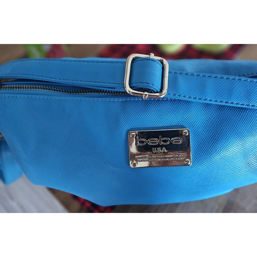 BEBE LOGO Turquoise Crossbody/ Shoulder bag Purse. Fashionable , hot color